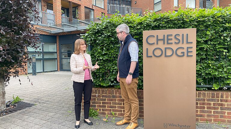 New County Councillor Paula Ferguson talking to City Councillor Mark Reach outside Chesil Lodge